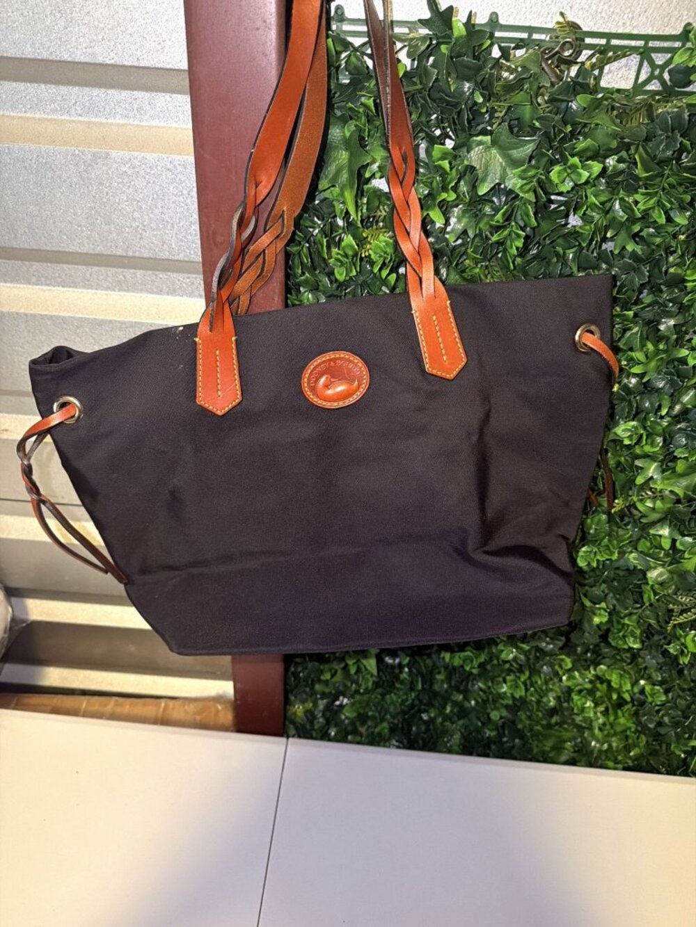 Dooney & Bourke trapezoid canvas tote with dual braided shoulder straps